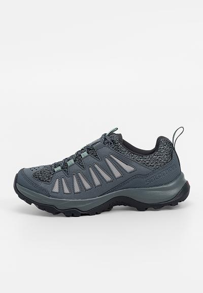 Chaussures de randonnée grises avec tige en maille, semelle en caoutchouc, pointe renforcée et accents teal contrastants sur les côtés et les lacets.