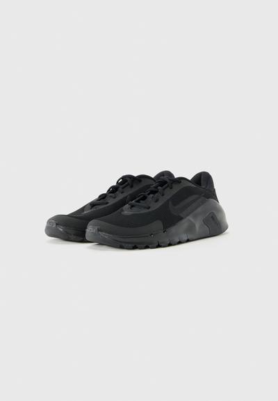 Une paire de chaussures de course Nike Flex noires avec une tige en mesh et une semelle en caoutchouc, présentée sur un fond clair uni.